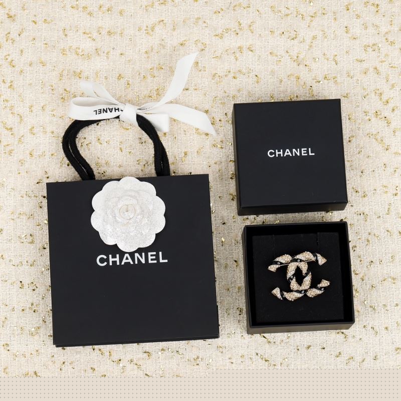 Ch*el brooches